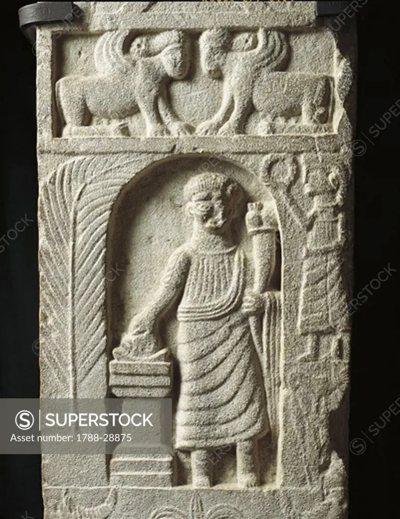 Punic civilization - Tunisia - Tophet of Carthage - 2nd century b.C. - Votive stele with a relief representing a sacrifice to Goddess Tanit. At the top, two sphinxes