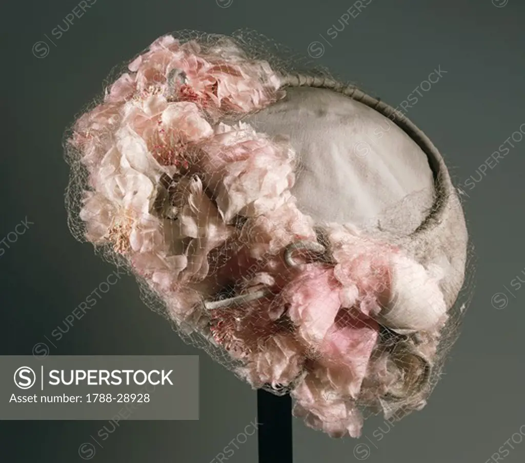 Fashion, 20th century. Women's grey synthetic chiffon hat with veil, ornamented with flowers, 'Mode Laurenti-Bologna-Modello', around 1950.