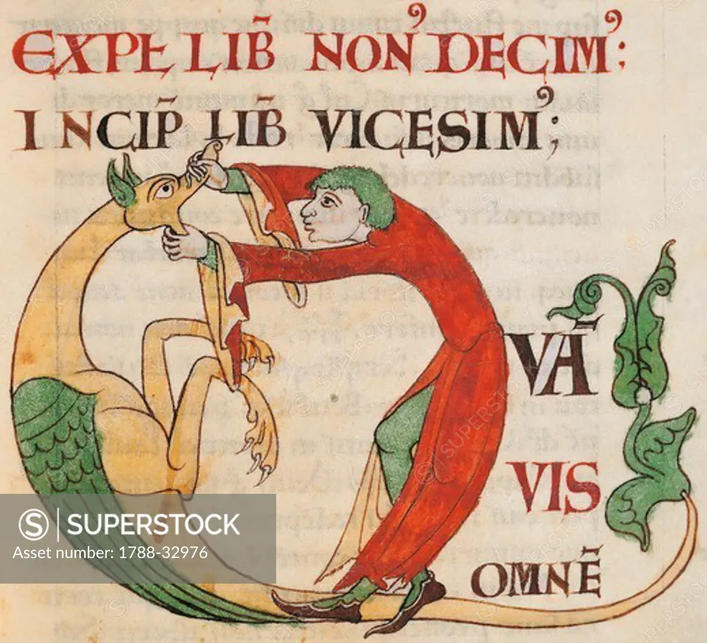 Initial capital letter Q depicting a man opening a monster's mouth, miniature from the Morals on the Book of Job (Moralia in Job) by Saint Gregory the Great, manuscript 173 folio 29 r, Citeaux, France 12th Century.