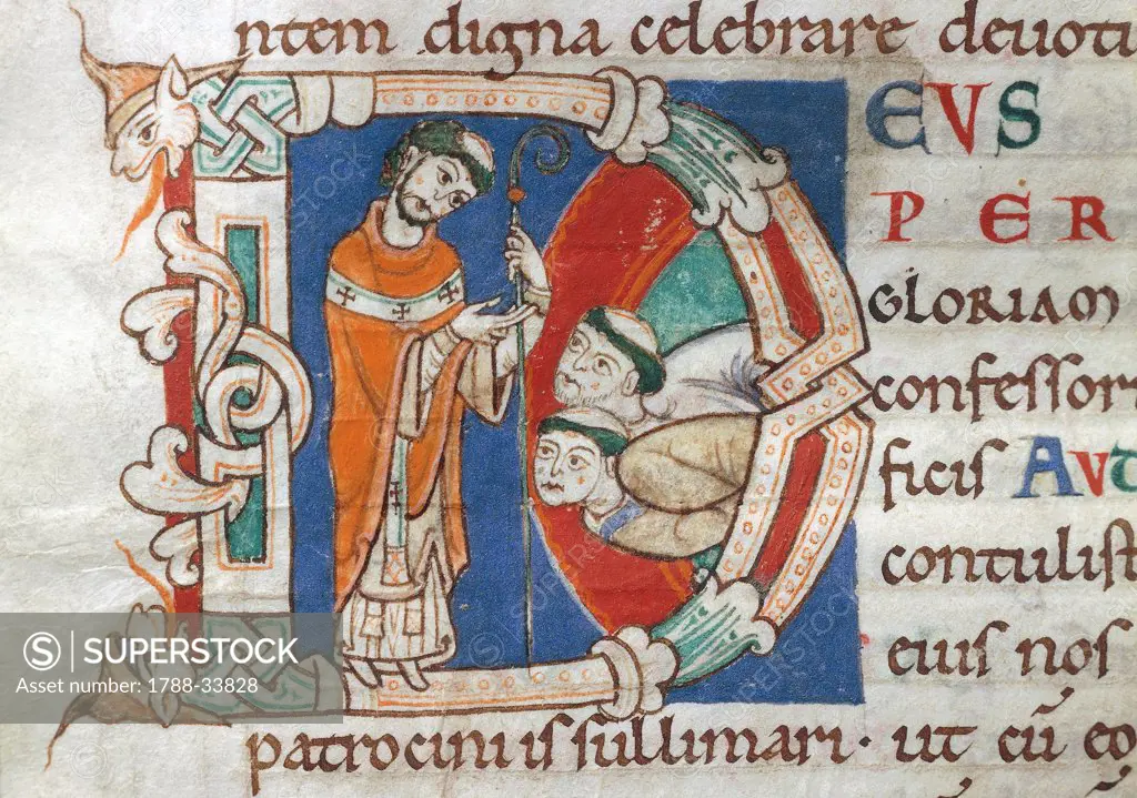 Initial capital letter D with Saint Audoin, who is blessing two monks, miniature from a Latin manuscript, 11th Century.