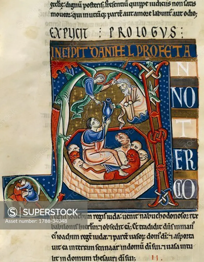 Daniel in the lion's den, miniature from the Bible of Souvigny, Latin manuscript 1 folio 185 recto, 12th Century.