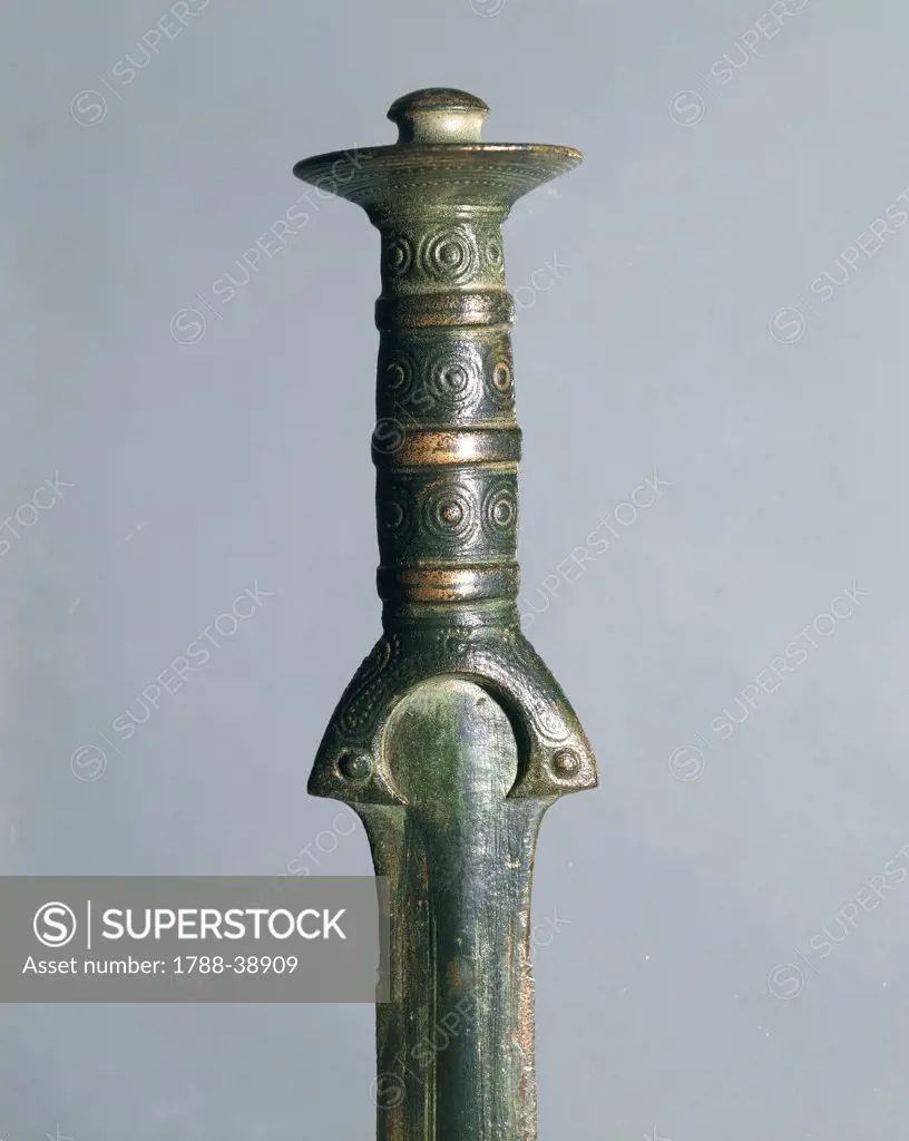 Prehistory, Italy, Bronze Age. Bronze sword hilt. From Prato Pagano, province of Como.