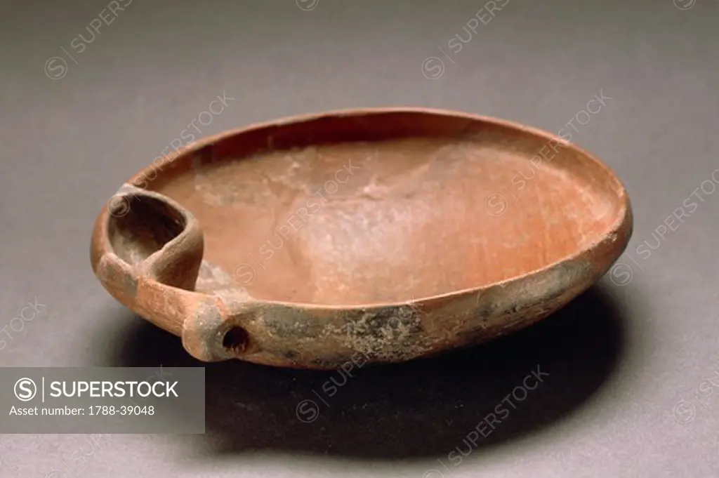 Nuragic civilization. Fictile bowl with side compartment. From Sardinia Region.