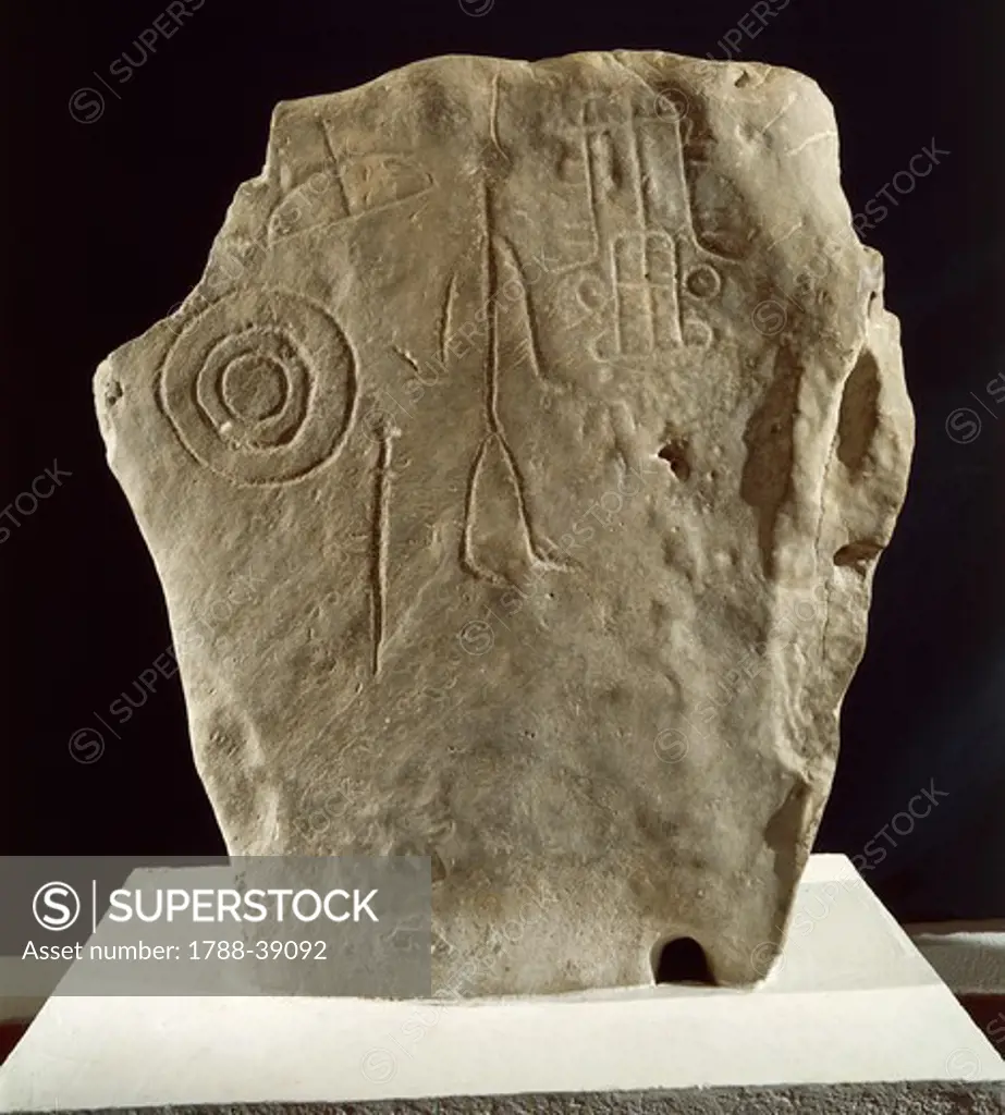 Prehistory, Spain, Bronze Age. Stele from Carmona with engravings depicting: a two-horses chariot and a warrior holding shield, bow and sword.