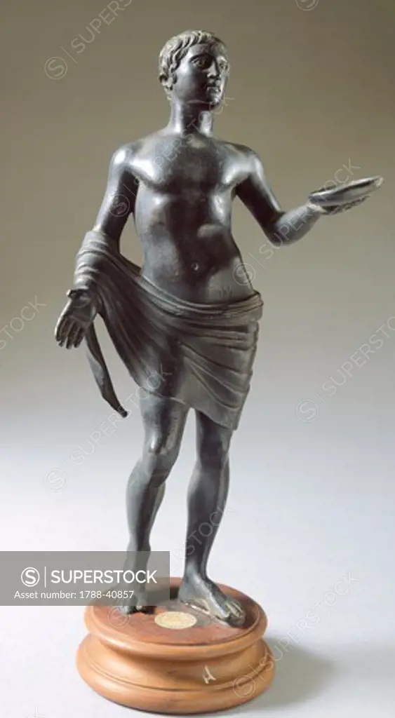 Male figure in bronze making an offering. Etruscan Civilization, 330-300 BC.