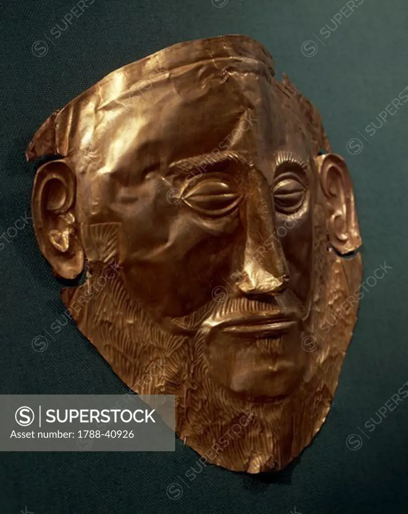 Gold funerary mask from an Achaean king, known as the mask of Agamemnon, from Tomb V of the Circle of Mycenae (Greece). Goldsmith art, Mycenaean Civilization, 16th Century BC.
