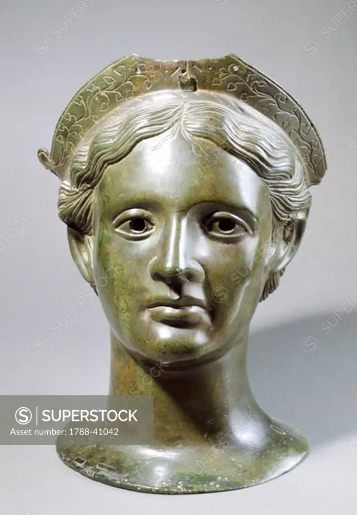 Bronze head of a god. Etruscan civilization, 300-250 BC.