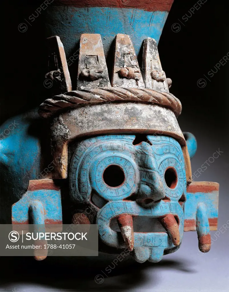 Polychrome pottery vase depicting Tlaloc, god of rain, height 35cm. Artifact originating from the Mayor Temple in Tenochtitlan (Mexico). Detail of the face of divinity. Aztec Civilization, 15th Century.