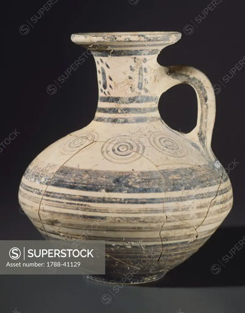 Oinochoe with round opening. Geometric pottery the Necropolis of Casal del Fosso, Veio (Lazio). Etruscan Civilization, ca 750-725 BC.