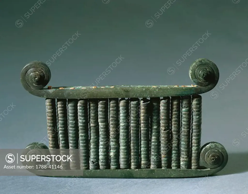 Musical instrument made of bronze from the Necropolis in Macchiabate, in Francavilla Marittima, Calabria, Italy. Ancient Greek civilization, Magna Graecia, 6th Century BC.