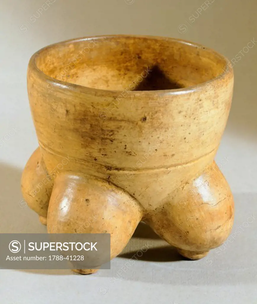 Vase with four feet originating from El Salvador. Pre-Colombian Civilization.