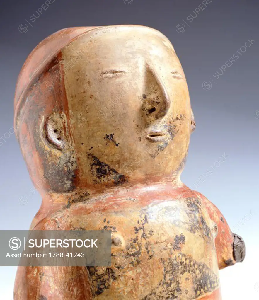 Terracotta female figurine originating from Colombia, detail of upper part. Pre-Colombian Quimbayas Civilization, 10th-16th Century.