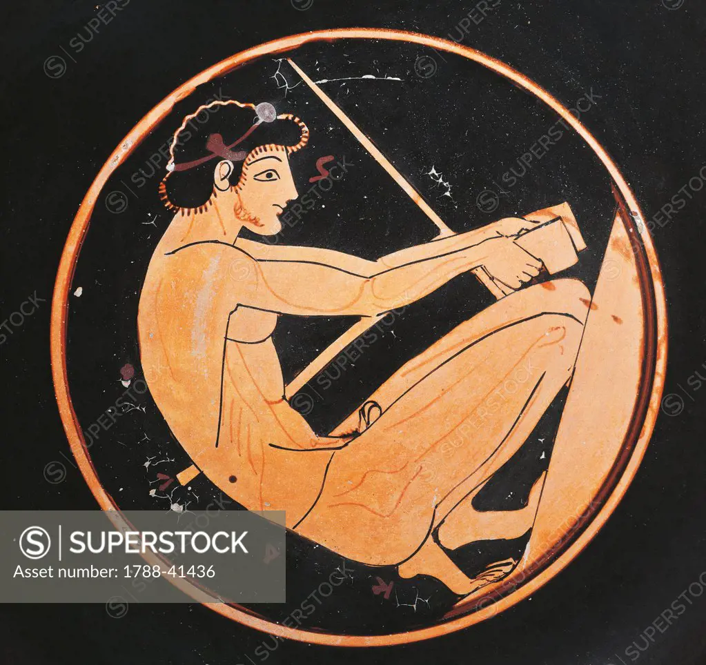 Kylix depicting an athlete lifting weights, red-figure pottery, Italy. Detail of the interior. Ancient Greek civilization, Magna Graecia, 5th Century BC.