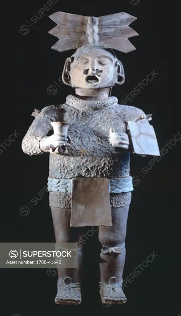 Statue of the god of spring Xipe Totec, artifact originating from Tlamimilelpan (Mexico). Pre-Colombian Teotihuacan Civilization,