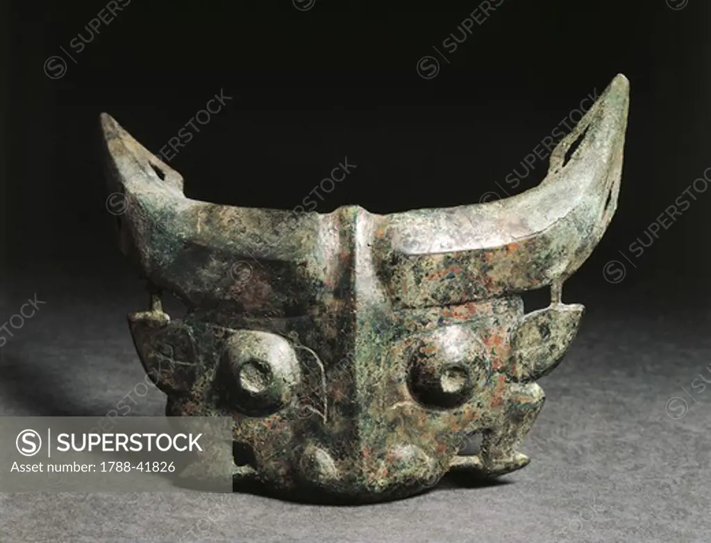 Ritual mask depicting a Taotie, China. Chinese Civilisation, Western Zhou Dynasty, 11th-8th century.