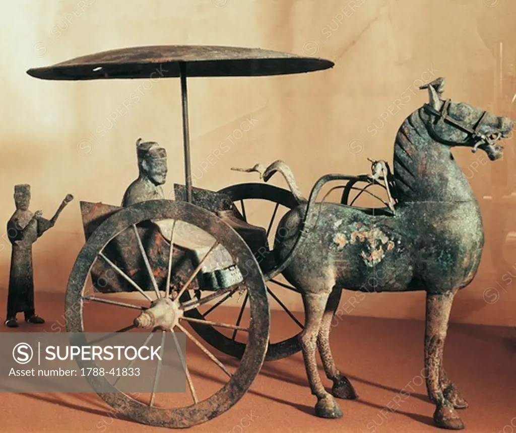 Horse-drawn cart with a driver and an attendant, a bronze model found in Wuwei Gansu, China. Chinese Civilisation, Eastern Han Dynasty, 2nd century.