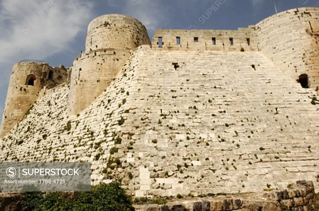 Syria - Qal'at al-Hisn. Crac (Krak) des Chevaliers. UNESCO World Heritage List, 2006. Largest built Hospitallers fortress on earlier Muslim site, 12-13th century