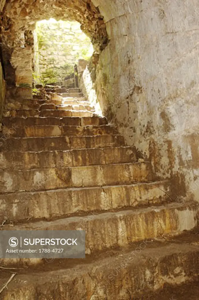 Syria - Qal'at al-Hisn. Crac (Krak) des Chevaliers. UNESCO World Heritage List, 2006. Largest built Hospitallers fortress on earlier Muslim site, 12-13th century. Stairs lead to hammam