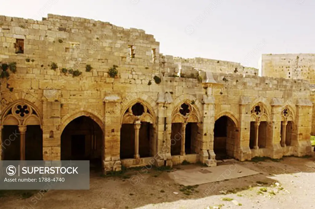 Syria - Qal'at al-Hisn. Crac (Krak) des Chevaliers. UNESCO World Heritage List, 2006. Largest built Hospitallers fortress on earlier Muslim site, 12-13th century. Courtyard, entrance to the main hall