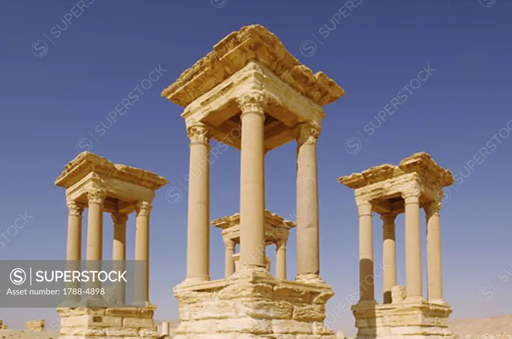 Syria - Palmyra. Ancient Palmyra. UNESCO World Heritage List, 1980. Ruins of ancient city, 1st-2nd century AD. 'Tetrapylon', four sets of four columns