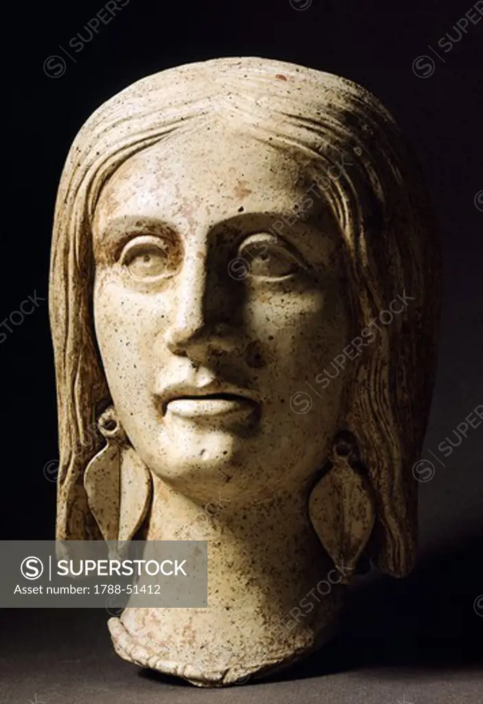 Female head, terracotta sculpture from the site of Lavinium-Pratica di Mare, Lazio, Italy. Latin Civilization, 5th Century BC.