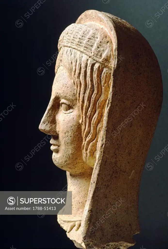 Female head, terracotta sculpture from the site of Lavinium-Pratica di Mare, Lazio, Italy. Latin Civilization, 5th Century BC.