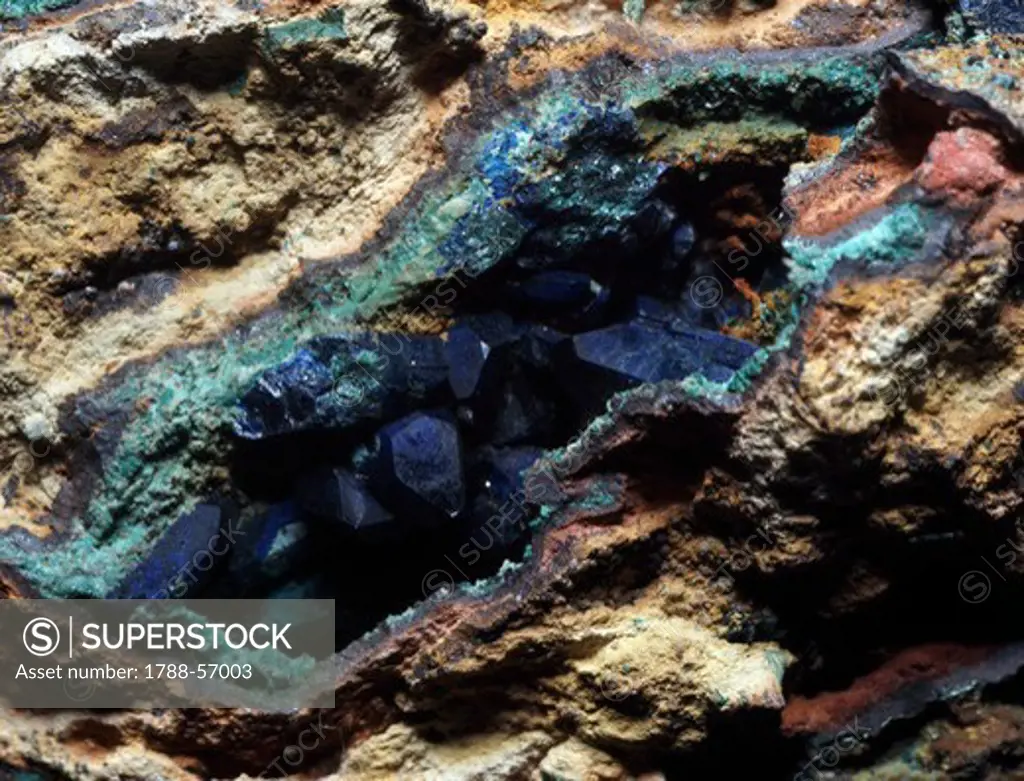 Azurite in prismatic crystals, carbonate, in Limonite outcrop.