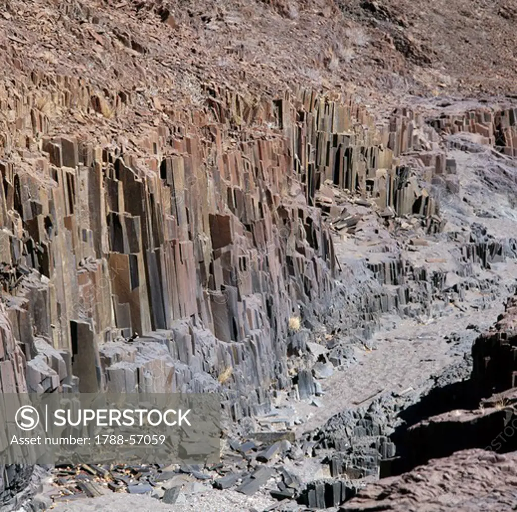 Organ Pipes, formed by volcanic intrusion, Burnt Mountain, Namibia.