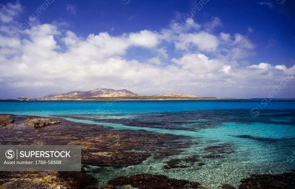 The sea at Rada dei Fornelli and the island of Asinara in the background, Sardinia, Italy.