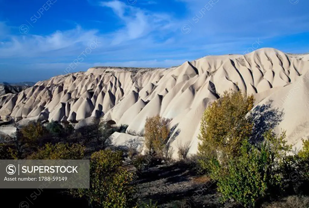 Petrified desert, effects of volcanic rock erosion, Uchisar, Cappadocia, Turkey.