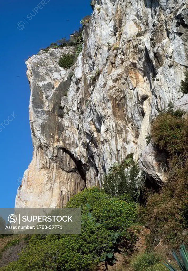 The Balzi Rossi (Red cliff), dolomitic limestone rich in iron ore, Ventimiglia, Liguria, Italy.