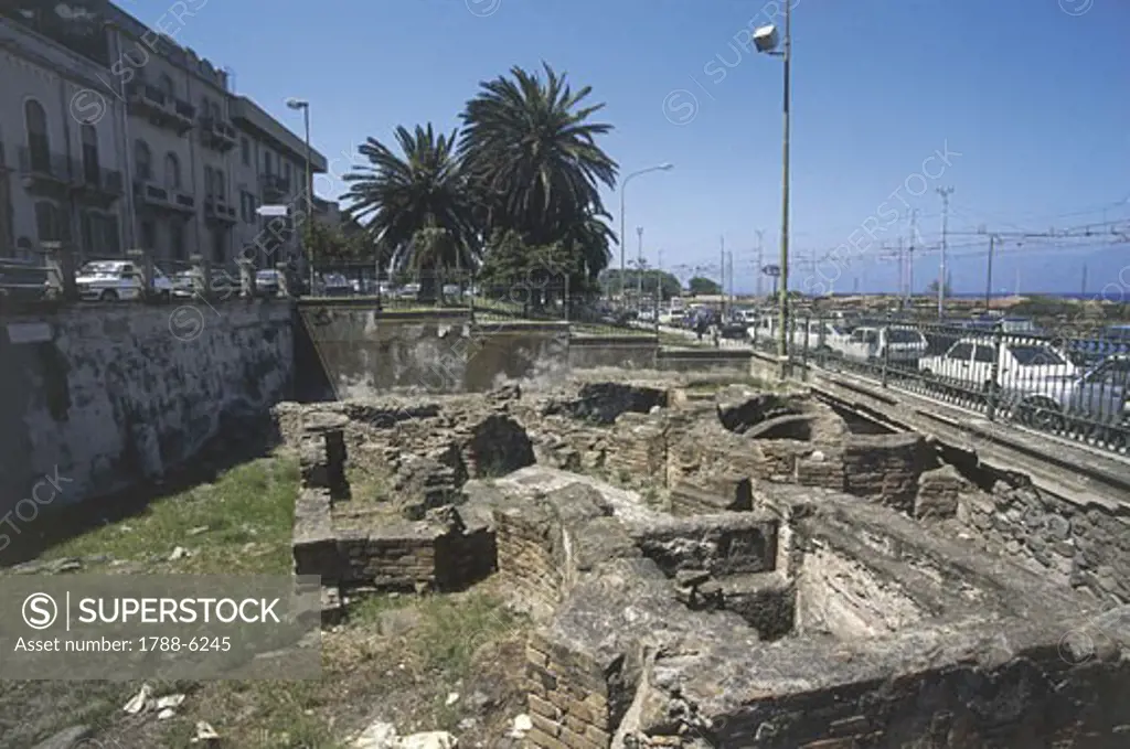 Old ruins in a city, Roman Baths, Reggio Di Calabria, Calabria, Italy