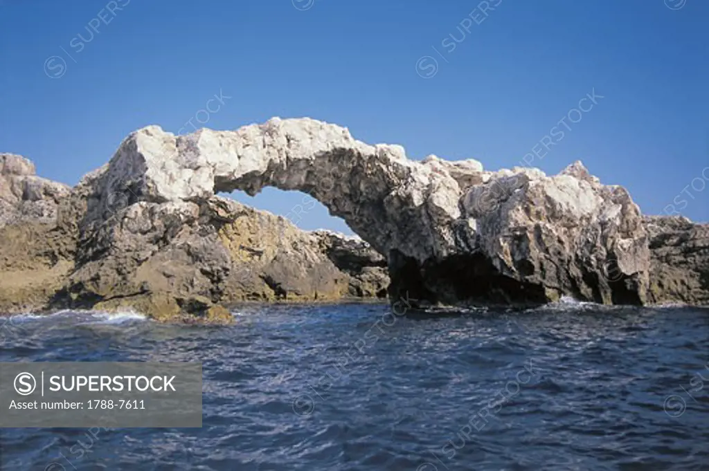 Natural arch in the sea, Gargano National Park, Architiello Di Capraia, Capraia Island, Puglia, Italy