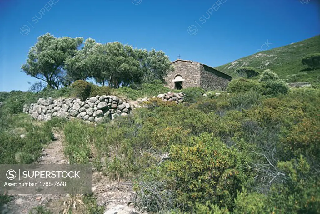 Low angle view of a church on a mountain, St. Stephen's Church, Capraia Island, Tuscany, Italy