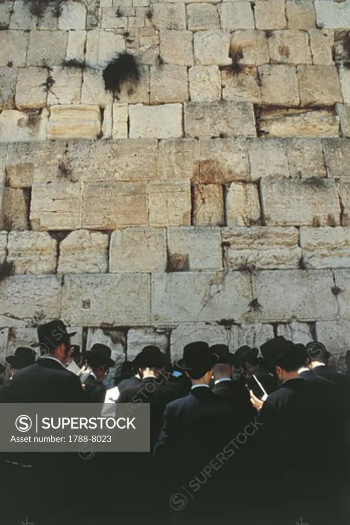 Israel - Jerusalem - the Old City (UNESCO World Heritage List, 1981). Children praying in front of the Wailing Wall