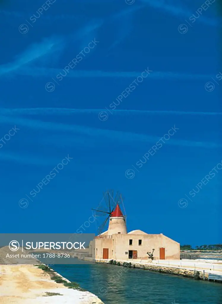 Windmill near salt flats, Infersa Saltworks, Marsala, Sicily, Italy