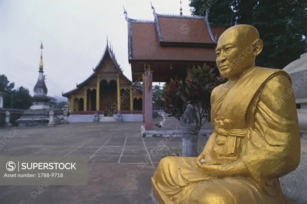Laos, Louangphrabang, Golden Statue of Buddha at Vat Xieng Thong Buddhist Monastery