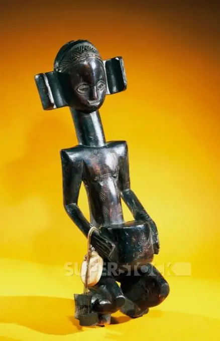 Wooden Luba statue of a female figure, Zambia.