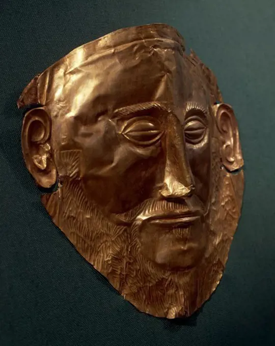 Gold funerary mask from an Achaean king, known as the mask of Agamemnon, from Tomb V of the Circle of Mycenae (Greece). Goldsmith art, Mycenaean Civilization, 16th Century BC.