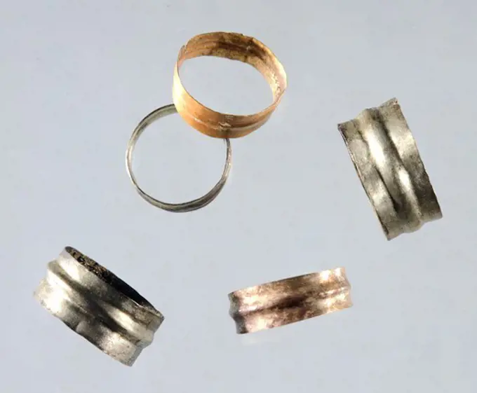 Gold rings and hair ties from Tomb F in the Agora of Corinth, (Greece). Goldsmith art, Greek Civilization, 9th-8th Century BC.