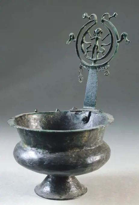 Cup with handle (ansa). Bronze artefact from Campi Bisenzio (Tuscany). Etruscan civilization, 8th Century BC.