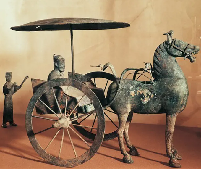 Horse-drawn cart with a driver and an attendant, a bronze model found in Wuwei Gansu, China. Chinese Civilisation, Eastern Han Dynasty, 2nd century.