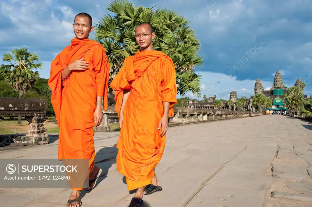 Cambodia, Siem Reap Province, Angkor Temples complex, listed as World Heritage by UNESCO, monks visiting Angkor Wat Temple of the 12th century