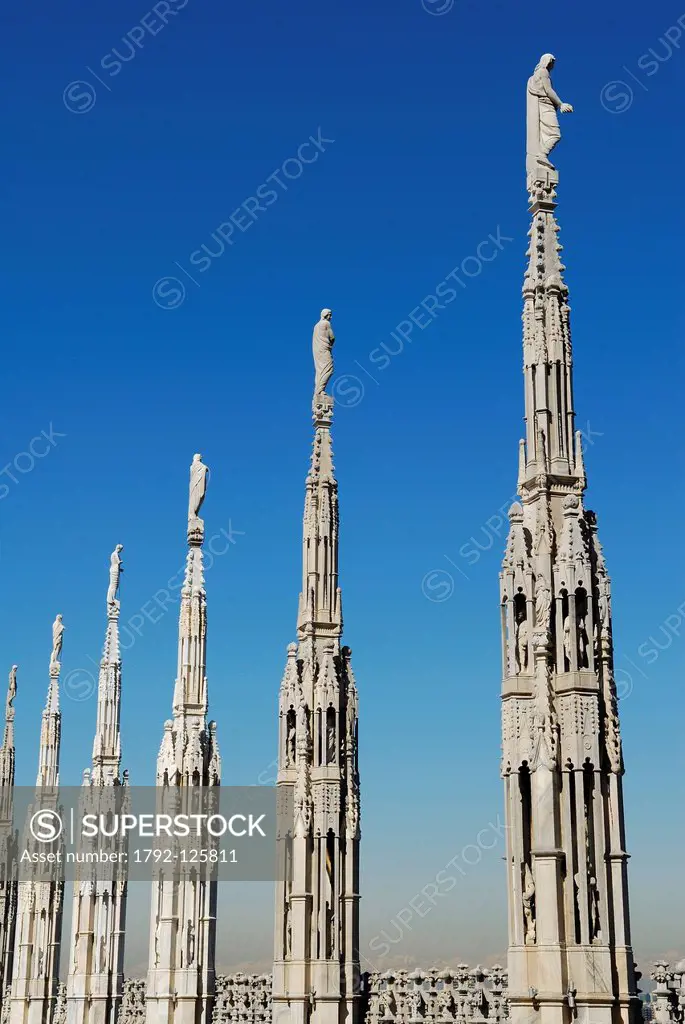 Italy, Lombardy, Milan, spires and statues of the Duomo seen from the terrace on the roof of the cathedral
