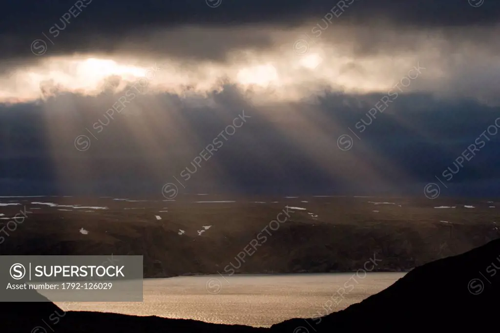 Norway, Lapland, Finnmark County, Vardo, ray of light over Varanger Peninsula