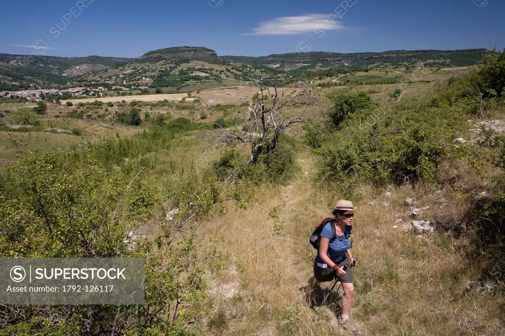 France, Ardeche, Plateau du Coiron, Saint Jean le Centenier, female hiker on a track