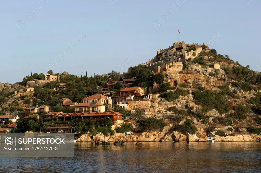 Turkey, Mediterranean Region, Turquoise Coast, Lycia, Kekova Bay, near Kas, Kalekoy, view of the village and fortress
