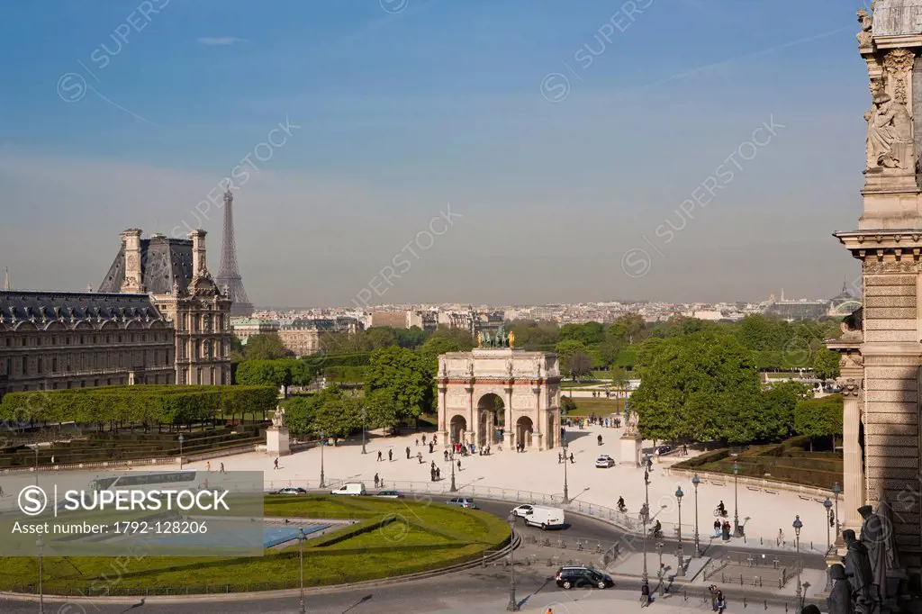France, Paris, the esplanade of the Louvre Carrousel Arch, and the Eiffel Tower
