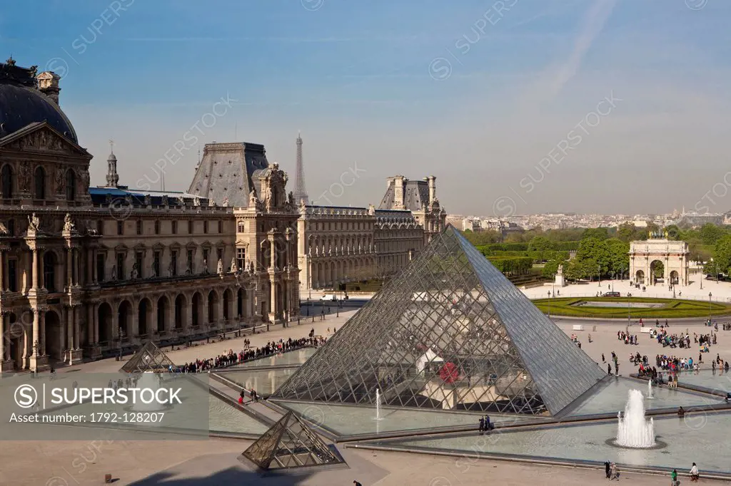 France, Paris, the esplanade of the Louvre with the Pei pyramid and the Eiffel Tower