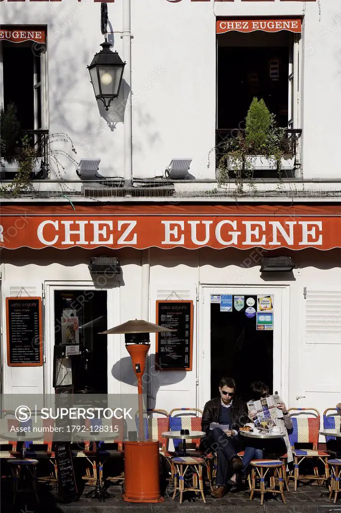France, Paris, The Butte Montmartre, Place du Tertre, people sitting at the terrace of the restaurant Chez Eugene